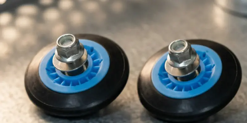 LG dryer drum support rollers — four rollers that replace traditional bearing function