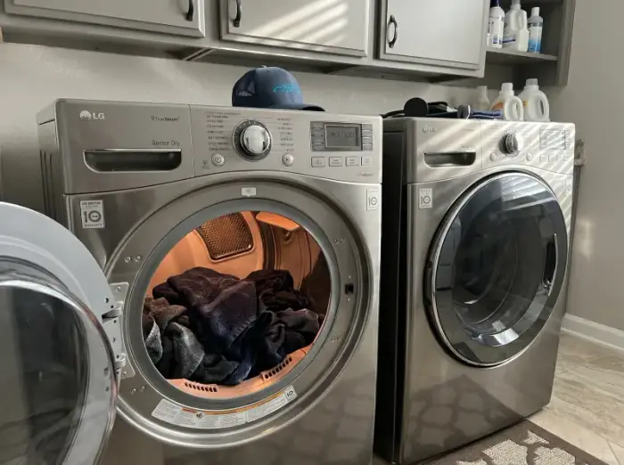 Wet damp clothes removed from LG dryer after full cycle — not drying